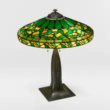 J.A. Whaley Co., Table lamp with swirling leaves, c. 1905, leaded glass, patinated bronze