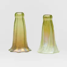 Lily shades, set of two by attribution Tiffany Studios, c. 1900, hand-blown Favrile glass, sold Mar 2024