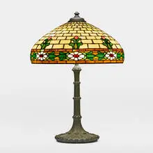Wilkinson Co., Daisy table lamp, c. 1912, Verde Antique-patinated metal, leaded glass