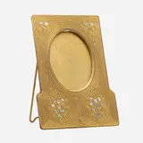 Abalone picture frame by Tiffany Studios, c. 1920, acid-etched and gilt bronze, glass, mother-of-pearl, sold Mar 2024