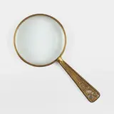 Abalone magnifying glass by Tiffany Studios, c. 1920, gilt bronze, glass, mother-of-pearl, sold Mar 2024