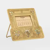 Tiffany Studios, Abalone perpetual calendar frame, c. 1920, gilt bronze, mother-of-pearl, printed card stock