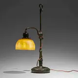 Damascene table lamp by Tiffany Studios, c. 1910, patinated bronze, hand-blown Favrile glass, sold Mar 2024