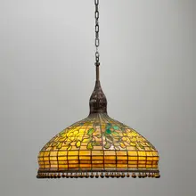 Swirling Leaf chandelier by Tiffany Studios, c. 1910, leaded glass, patinated bronze, sold Mar 2024
