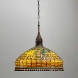 Swirling Leaf chandelier by Tiffany Studios, c. 1910, leaded glass, patinated bronze, sold Mar 2024