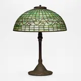 Vine Border (Acorn) table lamp by Tiffany Studios, c. 1910, leaded glass, patinated bronze, sold Mar 2024