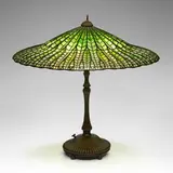 Exceptional Lotus Pagoda table lamp by Tiffany Studios, c. 1910, leaded glass, patinated bronze, sold Mar 2024
