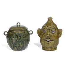 Sam Manno, Lanier Meader's-style face jug, 1988; together with an associated lidded face jar, 1988