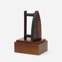Cadeau by Man Ray, cast iron, steel tacks, sold Jan 2019