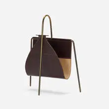 magazine rack by Carl Auböck, c. 1950, brass, leather, sold Jan 2019