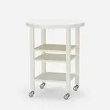 Stanley Tigerman and Margaret McCurry, Custom rolling cart from the Neisser Condominium, 1997, corian, lacquered MDF and wood, rubber, enameled steel