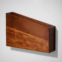 Wall-mounted shelf by Wharton Esherick, walnut, sold Mar 2024