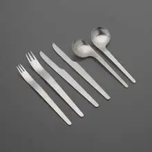 AJ flatware service by Arne Jacobsen, 1957, stainless steel, sold Mar 2024
