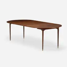 Extension dining table by Modern, c. 1960, walnut, sold Mar 2024