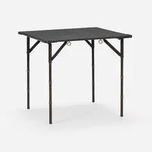 Game table by attribution Jacques Adnet, c. 1950, saddle-stitched leather over steel and wood, brass, sold Mar 2024