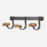 Jacques Adnet, Coat rack, c. 1950, saddle-stitched leather over steel, bamboo