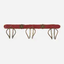 attribution Jacques Adnet, Coat rack, c. 1950, saddle-stitched leather over steel, brass