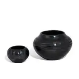 earthenware vases, two by Maria Montoya Martinez, Julian Martinez, and Maximiliana Martinez, sold Jun 2021