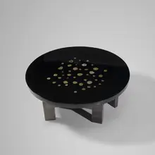 Ado Chale, coffee table, c. 1970, cast resin with inlaid hematite, steel, gold-mounted Ceylon ruby