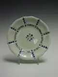 Jessie M. King, A circular plate,