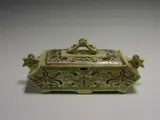 Christopher Dresser, A pottery vegetable tureen and cover,