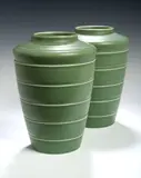 Keith Murray, A pair of Wedgwood green ground vases,