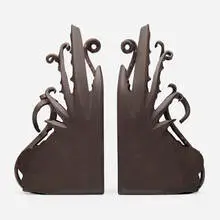 Spike bookends, pair by Albert Paley, 1993, forged and fabricated steel with a natural finish, sold Mar 2024