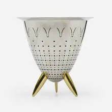 Max le Chinois colander by Philippe Starck, 1990, polished stainless steel, brass, plastic, sold Mar 2024