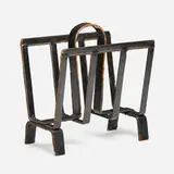 Jacques Adnet, Magazine rack, c. 1950, saddle-stitched leather over steel