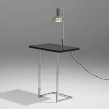 Lamp table by Modern, c. 1950, chrome-plated steel, painted wood, glass, sold Mar 2024