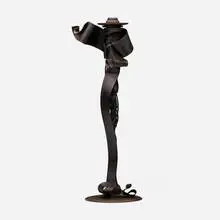 Candleholder by Albert Paley, 1992, forged and fabricated steel with a blackened finish, removable brass bobeche (collar), sold Mar 2024