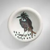 Oiseau avec touffe ashtray by Pablo Picasso, 1952, white earthenware with oxidized paraffin decoration and enamel, sold Feb 2024
