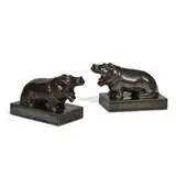 Arthur Conant for Rookwood Pottery, porcelain Nubian Black glaze hippopotamus bookends, pair