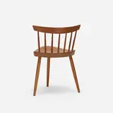 Mira chair by George Nakashima, c. 1970, American black walnut, cherry, sold Oct 2018
