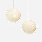 Early and Rare Akari Light Sculptures model 19A, pair by Isamu Noguchi, c. 1951, rice paper, bamboo, steel wire, sold Oct 2018