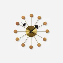 George Nelson & Associates, Ball wall clock, model 4755, 1949, brass, walnut, enameled aluminum