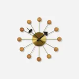 Ball wall clock, model 4755 by George Nelson & Associates, 1949, brass, walnut, enameled aluminum, sold Sep 2018