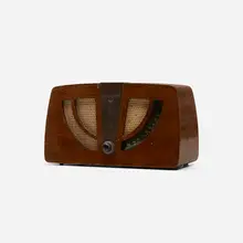 Charles and Ray Eames, radio, model 6D030, 1946, walnut plywood, brass, upholstery, Bakelite