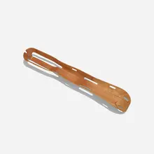 leg splint by Charles and Ray Eames, 1943, molded mahogany plywood, sold Sep 2018