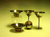 Stuart Devlin, A colletion of stainless steel tableware,, A colletion of stainless steel tableware,