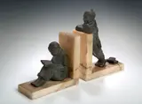 H M White, A pair of Art Deco bronze and onyx bookends,, A pair of Art Deco bronze and onyx bookends,