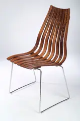 Hans Brattrud, A set of four 'Scandia' Dining Chairs,, manufactured by Hove Mobler, rosewood faced plywood slatted seat with shock absorbers and steel rod supports,