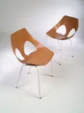 Carl Jacobs, A set of six Jason Chairs, manufactured by Kandya, the inter-locking back and seat of moulded plywood on later painted rod supports,