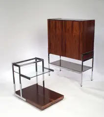 Tom Lupton and John Morton, for Merrow Associates, chrome plated frame with glass shelf and castors,