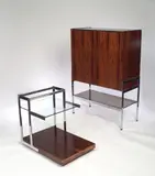 Tom Lupton and John Morton, for Merrow Associates, chrome plated frame with glass shelf and castors,
