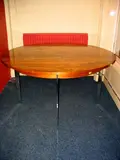 Tom Lupton and John Morton, for Merrow Associates, raised on four chrome plated and flattened steel supports,