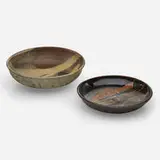 Shallow bowls, set of two by Toshiko Takaezu, c. 1978, glazed stoneware, sold Feb 2024