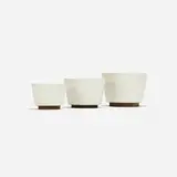 Malcolm Leland, planters, set of three, c. 1964, glazed stoneware, redwood