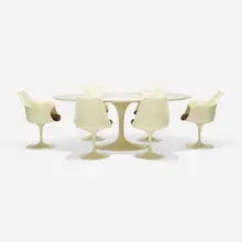 dining set by Eero Saarinen, 1956, enameled steel, laminate over lacquered wood, enameled aluminum, molded fiberglass, upholstery, sold Sep 2018