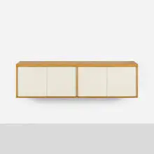 custom wall-mounted cabinet for the Rand House by Paul Rand, c. 1960, birch, lacquered wood, sold Sep 2018